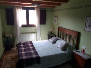 Postel nebo postele na pokoji v ubytování Ca la Cisca