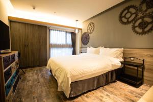 Letto o letti in una camera di Walker Hotel. Ximen