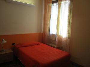 Postel nebo postele na pokoji v ubytování Affittacamere ACCASA