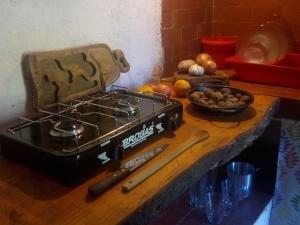 Η κουζίνα ή μικρή κουζίνα στο "Cafuné" Departamento +24 φωτογραφίες