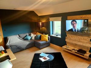 Μια τηλεόραση ή/και κέντρο ψυχαγωγίας στο La Chambre d'en Haut