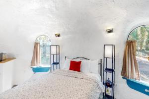 Voodi või voodid majutusasutuse McKenzie View Cottage toas