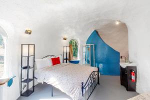 Voodi või voodid majutusasutuse McKenzie View Cottage toas