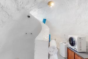 Voodi või voodid majutusasutuse McKenzie View Cottage toas
