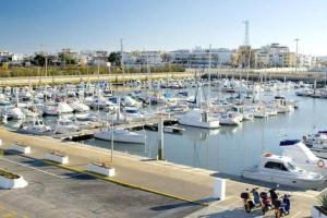 a group of boats docked in a marina at Casa mirando al mar, hermosas vistas. in Chipiona +12 photos