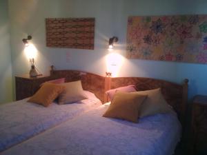 Letto o letti in una camera di Anna Koralli Studios