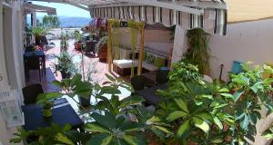 an overhead view of a room with plants and a bed at Corte Risco in Ogliastro Cilento