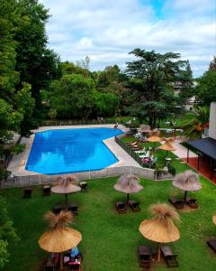 A view of the pool at Howard Johnson Resort & Spa Escobar or nearby