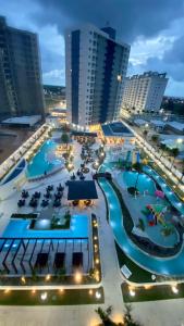 a view of a resort with several pools at Salinas Exclusive Resort in Salinópolis