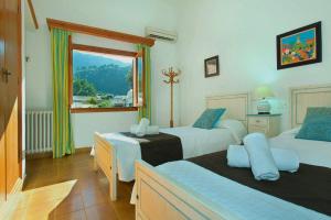 Postel nebo postele na pokoji v ubytování Villa Jaima by Sealand Villas + 16 fotografií