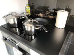 Kuchyňa alebo kuchynka v ubytovaní CR Apartament Centrum Zamenhofa 1