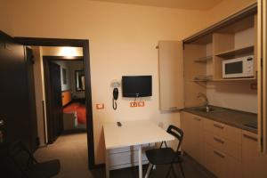 Kuchyň nebo kuchyňský kout v ubytování Hotel Belvedere Spiaggia
