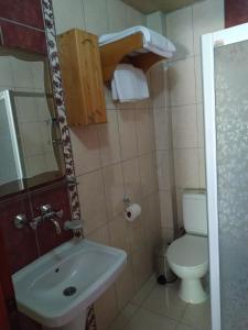 Koupelna v ubytování Olympos Yavuz Hotel
