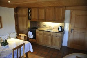 Kuchyň nebo kuchyňský kout v ubytování Chalet Nyati