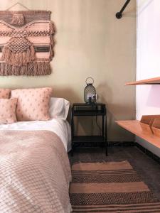 A bed or beds in a room at Alojamiento Rural El Gomis