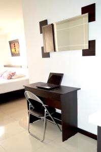 Postel nebo postele na pokoji v ubytování Hotel Mare Apartasuite