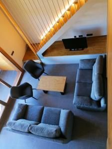 Posezení v ubytování Apartament "El Castell" Casa Rural Cal Rialla