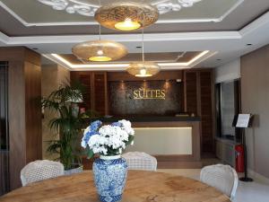 The lobby or reception area at K Suites Hotel
