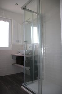 Koupelna v ubytování Precioso apartamento con magníficas vistas - Apartamento Aifos + 30 fotografií