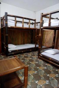 Letto o letti in una camera di Backpacker Kawah Ijen