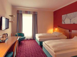 Postel nebo postele na pokoji v ubytování Mercure Hotel Ingolstadt