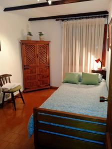Ліжко або ліжка в номері La Palmera - Santa Brígida, 3 dormitorios