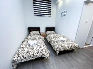 Postel nebo postele na pokoji v ubytování Kiko apartmani