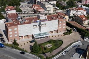 an overhead view of a building in a city at Hotel Centro di Spiritualità Padre Pio in San Giovanni Rotondo