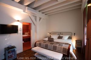 Letto o letti in una camera di Hotel 'T Sandt