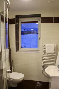 Kúpeľňa v ubytovaní Apartamenty Suzyw Pilsko