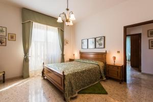 Giường trong phòng chung tại Il Rifugio di Amelia