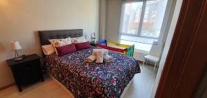 Posteľ alebo postele v izbe v ubytovaní VIVIENDA T. J.S.E