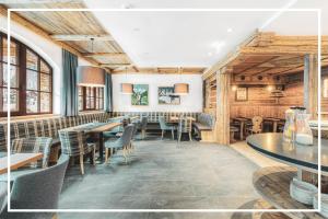 Reštaurácia alebo iné gastronomické zariadenie v ubytovaní Design-Appartementhaus - Urlaubsresort Hafele
