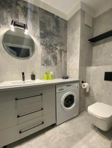Ванная комната в Apartament Wiczlino