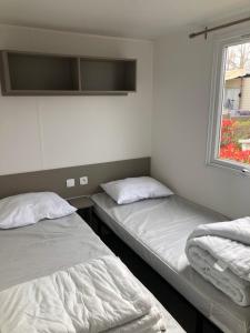 Кровать или кровати в номере GRS Mobil Home