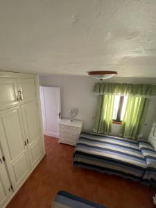 Łóżko lub łóżka w pokoju w obiekcie Villa Caleton