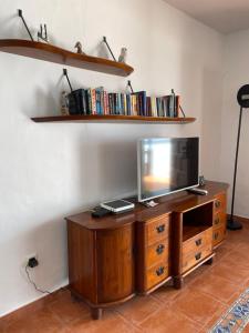 Telewizja i/lub zestaw kina domowego w obiekcie Villa Caleton