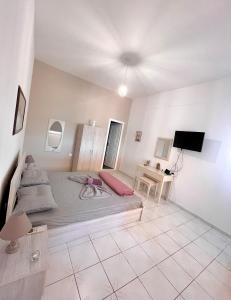 TV a/nebo společenská místnost v ubytování Seaview Apartments