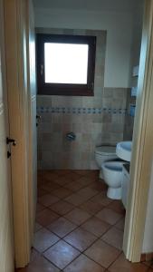 Koupelna v ubytování Appartamento Residence Mirice Vignola mare Aglientu casa Mattia + 32 fotografií