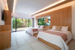 Mayan Monkey Tulum - Social Hotel客房内的一张或多张床位
