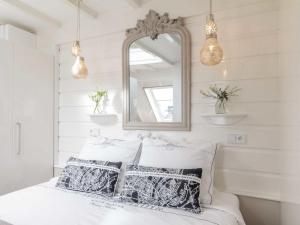 En eller flere senge i et værelse på Vakantiewoningen Prelude & Etude
