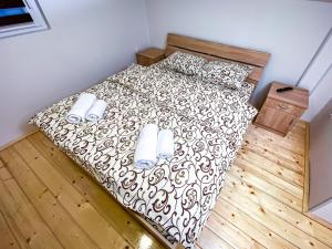 Postel nebo postele na pokoji v ubytování Kiko apartmani