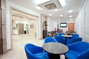 TV a/nebo společenská místnost v ubytování Hotel Thea