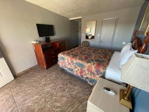 TV a/nebo společenská místnost v ubytování Sands Motel