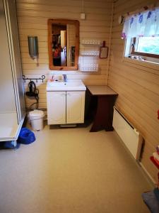 Kjøkken eller kjøkkenkrok på Kongsfjord Paradise Holiday