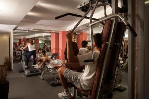 a group of people exercising in a gym at Virgilio Grand Hotel in Sperlonga