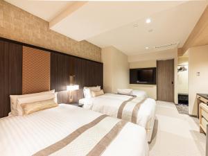 Postel nebo postele na pokoji v ubytování Hotel Musse Kyoto Shijo Kawaramachi Meitetsu + 37 fotografií