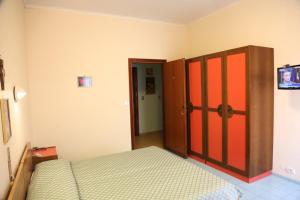 A bed or beds in a room at Ancelle Sorrento - Casa d'Accoglienza
