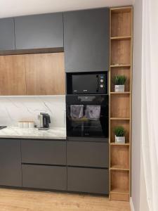 Kuchyňa alebo kuchynka v ubytovaní VIP квартира в центре города, новостойка в ЖК Prestige Apаrtments, Ровно