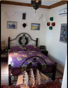 Letto o letti in una camera di Riad Tarik